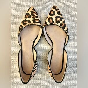 Chic faux leopard hair flats.